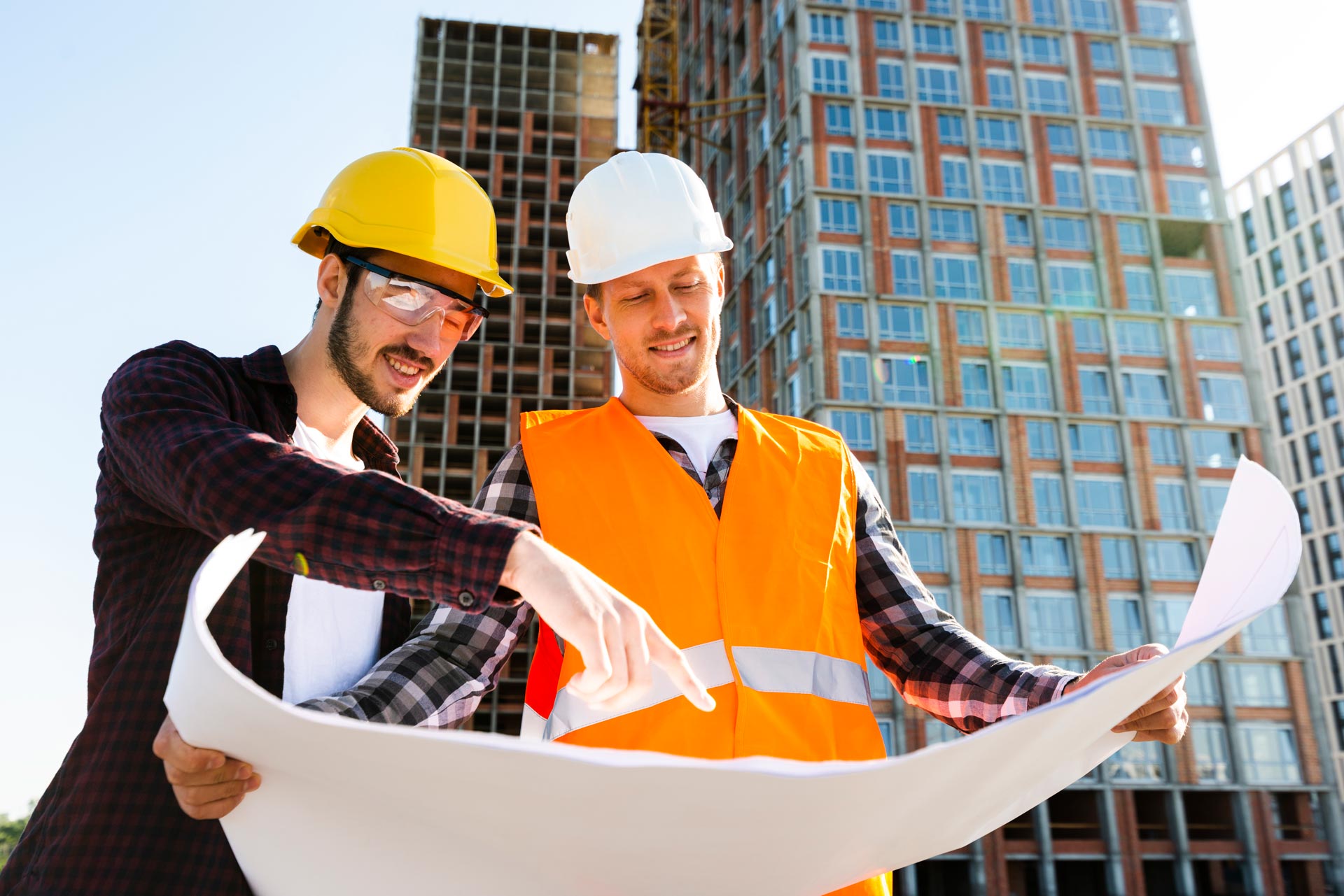 medium-shot-low-angle-view-engineer-architect-supervising-construction